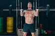 © Oscar Gimbal/ADDICTIVE STOCK - Strong male athlete doing deadlift with heavy barbell during workout in gym