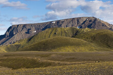 Magnificent Scenery Of Rocky Mountains With Peaks Illuminated By Sunlight In Rough Desert Terrain In Iceland