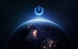 © dimazel - Earth Hour theme. Earth planet in outer space. Power button of electricity. Elements of this image furnished by NASA