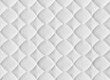 White seamless pattern. The fabric is sewn with a curly pattern. Mattress for bed.
