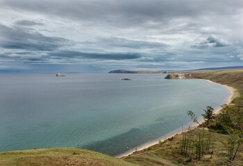 Lake Baikal in cloudy weather. Cold summer