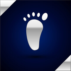 Sticker - Silver Foot massage icon isolated on dark blue background. Vector.