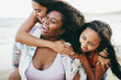 © DisobeyArt - Happy multiracial women with different bodies and skins having fun in summer day on the beach - Main focus on right girl face