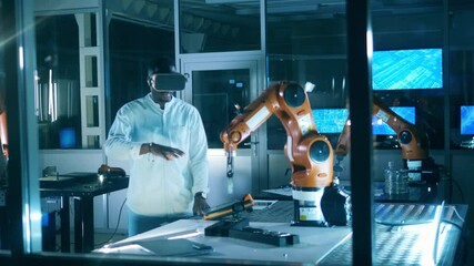 Wall Mural - african researcher is using a vr-device to operate a robot