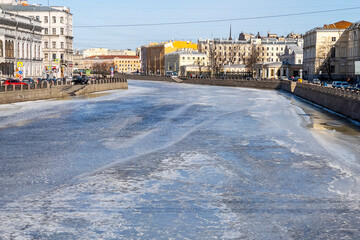 Wall Mural - St. Petersburg, Russia, March 6, 2021. View of the Fontanka river and its picturesque embankments in winter