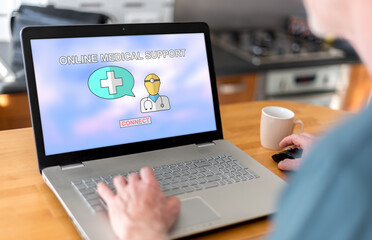 Wall Mural - Online medical support concept on a laptop