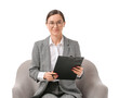 Portrait of female psychologist sitting in armchair on white background
