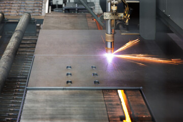 Industrial cnc plasma machine cutting of metal plate