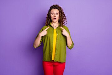 Sticker - Photo of astonished girl hear her choose decide she point index finger herself stare stupor wear green shirt pants trousers isolated over purple color background