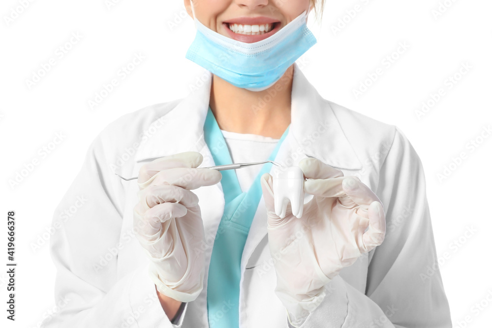 Female dentist on white background, closeup