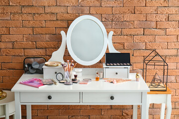 Poster - Dressing table with decorative cosmetics and accessories near brick wall