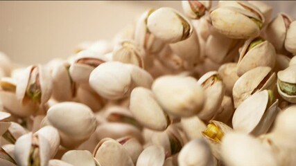Poster - Super slow motion of flying pistachios in rotating movement. Filmed on high speed cinema camera, 1000fps.
