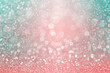 Fancy teal green confetti, coral pink glitter and pastel colors sparkle turquoise background for Spring or Christmas