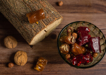 Poster - oriental sweet with nuts - churchkhela on a wood background