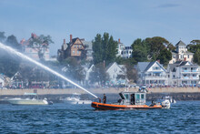USA, Massachusetts, Cape Ann, Gloucester. Gloucester Schooner Festival, Fireboat Welcome Salute With Water Cannon.