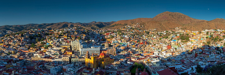 Wall Mural - Large size aerial panorama of Guanajuato city at sunset, Mexico.