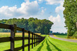 Amish country field agriculture, beautiful brown wooden fence, farm, barn in Lancaster, PA US