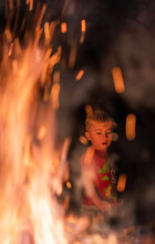 Cautious Child Near Flames