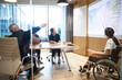 © Monet - 車椅子に乗った女性社員が指揮を執るプロジェクト会議