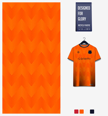 Wall Mural - Soccer jersey pattern design. Zig Zag pattern on orange abstract background for soccer kit, football kit or sports uniform. T-shirt mockup template. Fabric pattern. Sport background. 