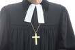 evangelical pastor wearing a golden cross