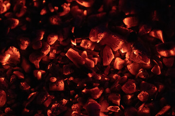 Hot Red Coal Background. Burning Fire in the dark