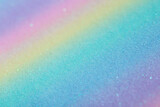 Fototapeta Tęcza - Iridescent rainbow background with glitter. Gradient texture with fine sparkles, macro photography