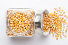 Organic Yellow Corn Seed Or Maize (Zea Mays) In A Glass Jar With Lid . Top View