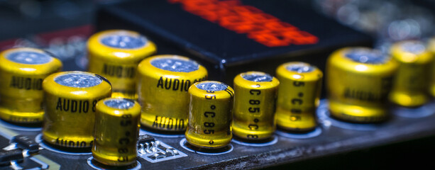 Poster - High quality audio capacitors on the computer motherboard. Digital music. Computer information technology illustration.