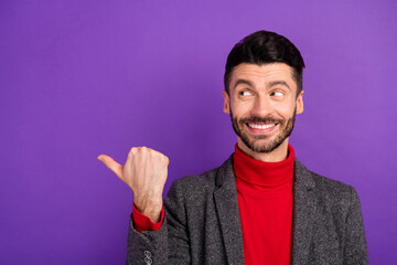 Sticker - Photo of optimistic nice brown hair man point look empty space wear red sweater jacket isolated on purple color background