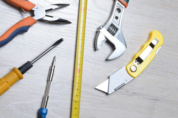 tools for minor home repairs are on the countertop. view from above.