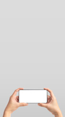 Poster - Vertical mockup hand holding mobile blank screen on grey background.mockup banner display of content to advert on media.Clipping path on both hand and smartphone screen.9:16 ration