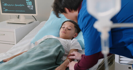 Doctor setting up iv for sick african kid resting in hospital bed