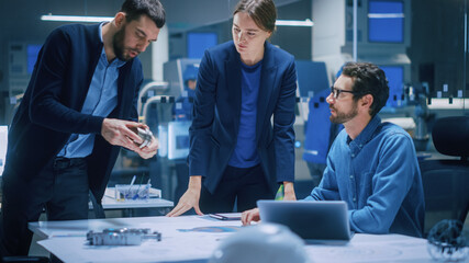 Poster - Modern Factory Office Meeting Room: Diverse Team of Engineers, Managers Talking at Conference Table, Look at Blueprints, Inspect Mechanism, Use Laptop. High-Tech Facility with CNC Machines