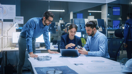 Poster - Factory Office Meeting Room: Team of Engineers Gather Around Conference Table, They Discuss Project Blueprints, Inspect Mechanism, Find Solutions, Use Laptop. Industrial Technology Factory