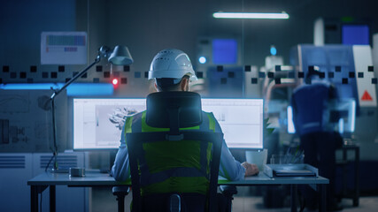 Poster - Industrial Engineer Solving Problems, Working on a Personal Computer, Two Monitor Screens Show CAD Software with 3D Prototype of Eco-Friendly Electric Engine Concept. Back View Shot