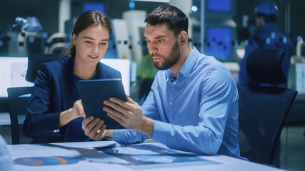 Aufkleber - Industry 4.0 Modern Factory Meeting Room: Chief Engineer Holds Digital Tablet, Shows it to Female Specialist, They Have Discussion. Professionals Design Electronic Machinery With Futuristic Design