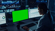 Professional Financial Data Analysts Working on a Computer with Green Screen in Modern Monitoring Office with Live Analytics Feed on a Big Digital Screen. Monitoring Room with Finance Specialists. 