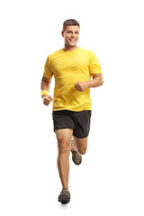 Canvas Print - Young man in sportswear running towards camera