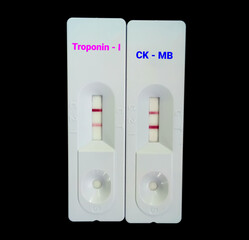 Sticker - Rapid test device or cassette for Troponin I and CK MB test, showing positive result. Rapid screening test, myocardial infraction