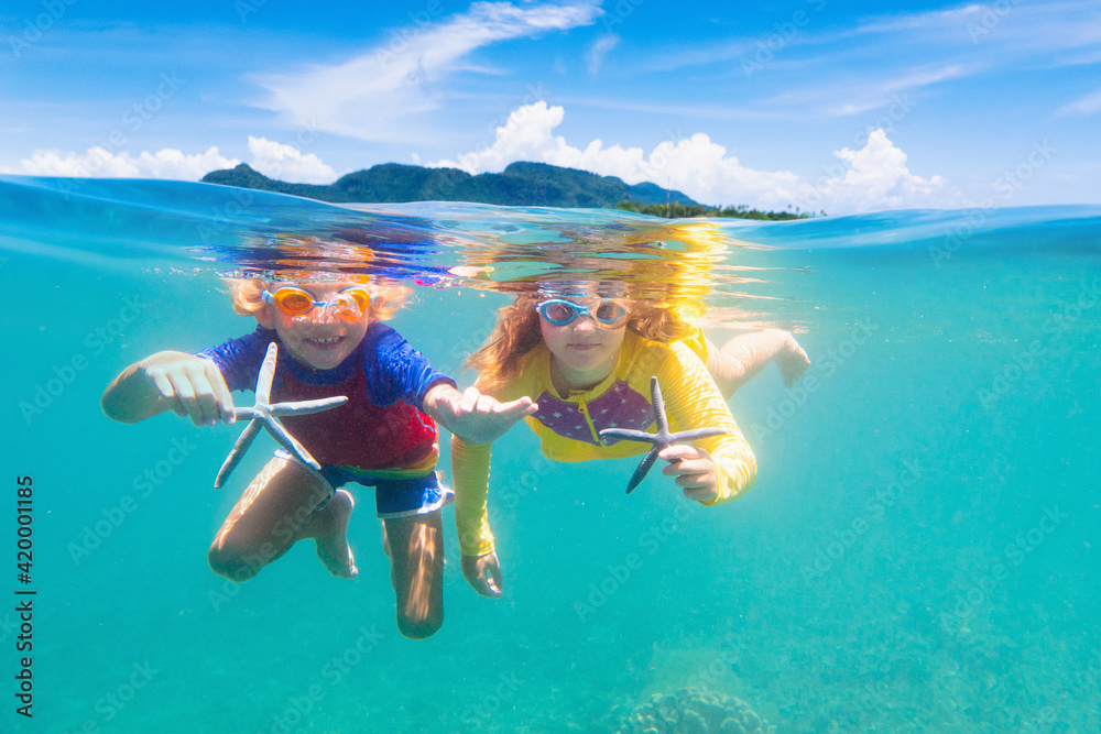 Child snorkeling. Kids underwater. Beach and sea. - obrazy, fototapety, plakaty 