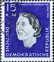 A Postage Stamp From Germany, GDR Showing A Portrait Of The Resistance Fighters Against Hitler By The Politician Charlotte Eisenblätter (1903–1944). Ravensbrück Memorial). Ravensbrück Memorial
