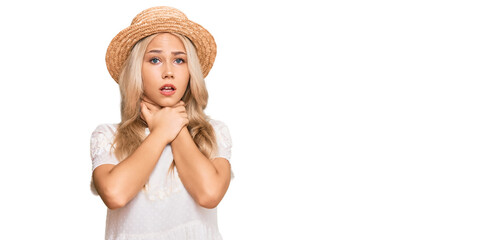 Canvas Print - Young blonde girl wearing summer hat shouting and suffocate because painful strangle. health problem. asphyxiate and suicide concept.