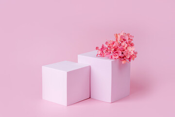 Wall Mural - geometric shapes podium for product display. monochrome platform with flowers on pink background. st