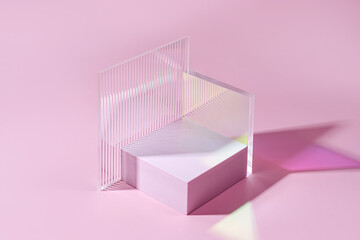 Wall Mural - geometric shapes podium for product display. monochrome platform with gloss acrylic sheets on pink b