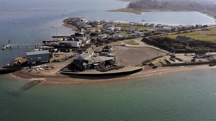 Wall Mural - Ferry Boat Inn and Ferry Point aerial video with Hayling Island Golf Course in view plus the Kench nature reserve  at this beautiful location.