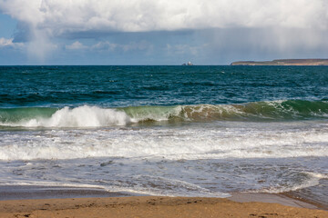 Carbis Bay (aka Barrepta Cove), and the view across St. Ives' Bay to Godrevy Point, Cornwall, UK