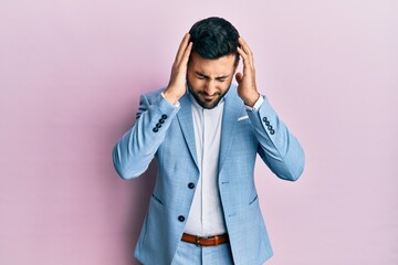 Sticker - Young hispanic businessman wearing business jacket suffering from headache desperate and stressed because pain and migraine. hands on head.