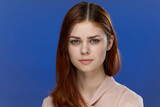 Fototapeta Młodzieżowe - attractive woman glamor cropped view smile blue background