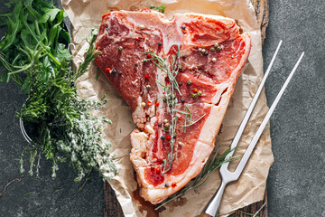 Raw fresh meat t-bone steak with spices